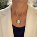 Gold, mother-of-pearl and enamel medal pendant 58 Facettes 310