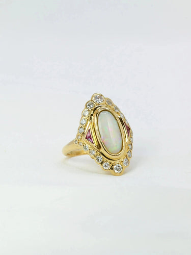 Bague marquise or jaune opale diamants