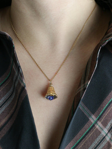 Pendentif Pendentif charms vintage cloche or jaune pierre bleue 58 Facettes 1099.6