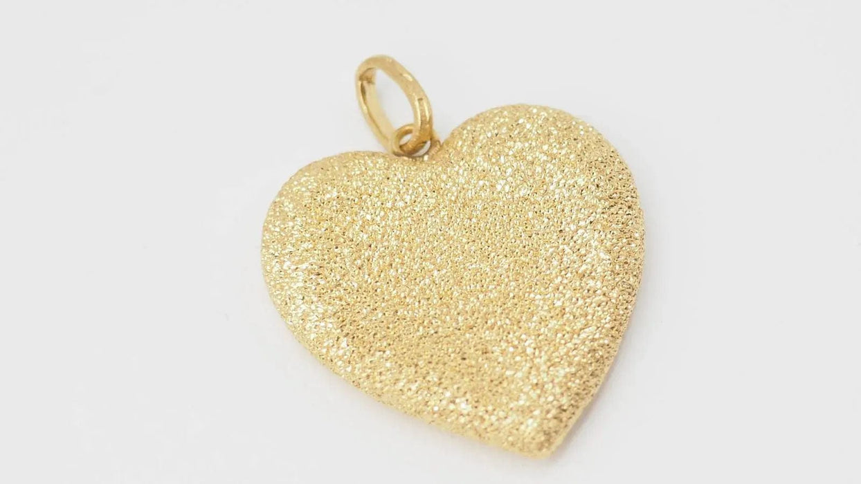 Pendentif Pendentif Coeur sablé de Carolina BUCCI en or jaune 58 Facettes 32863