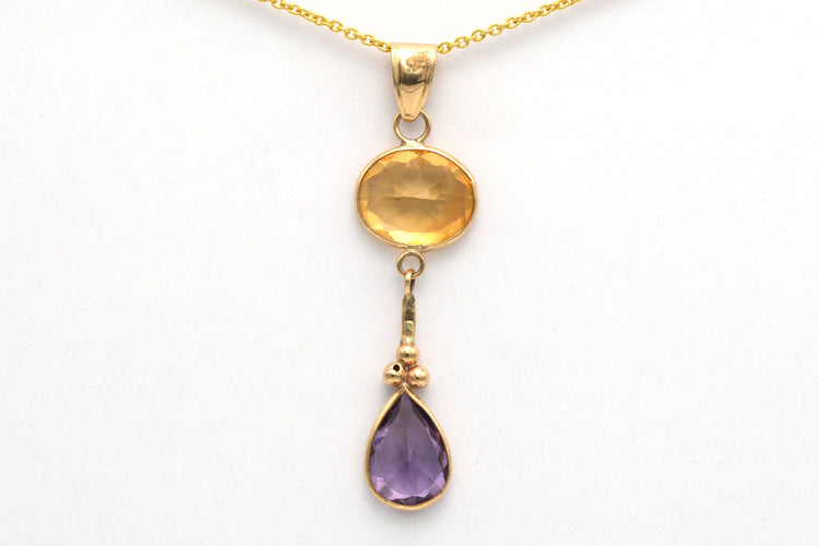 Pendentif Pendentif contemporain en or jaune, améthyste et citrine 58 Facettes 10798