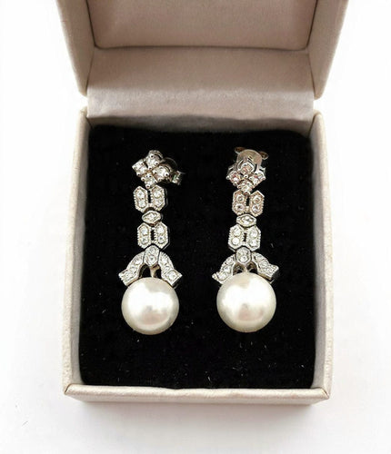 Boucles d'oreilles Boucles d'oreilles en platine avec perles et diamants 58 Facettes