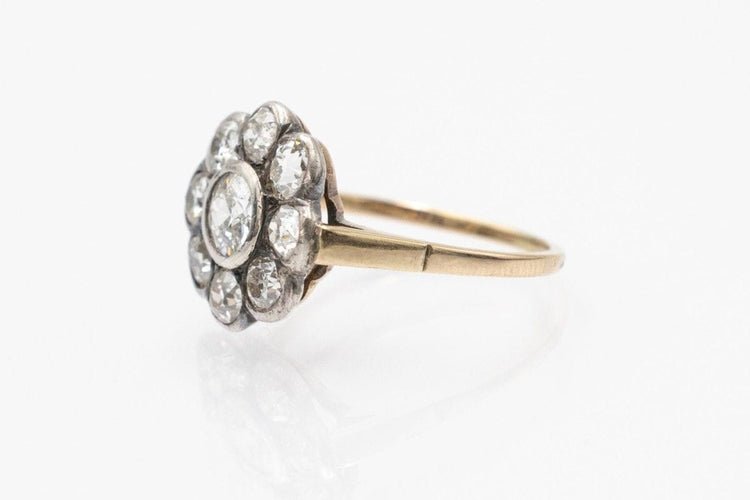 Bague 50.5 Bague marguerite en or jaune et argent sertie de diamants taille brillant ancien 58 Facettes 11223