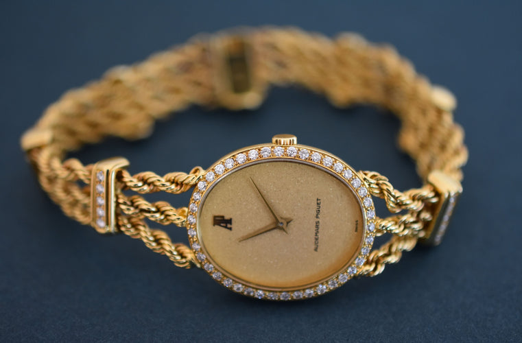 Montre Audemars Piguet - Montre joaillerie femme or jaune & diamants, 1981 58 Facettes AP-100