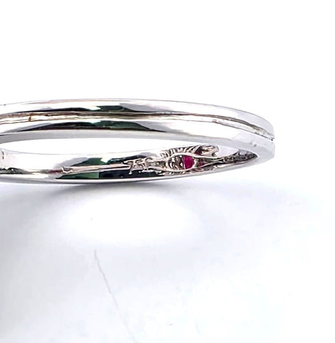 Bague 58 Bague en or blanc avec rubis et diamants 58 Facettes