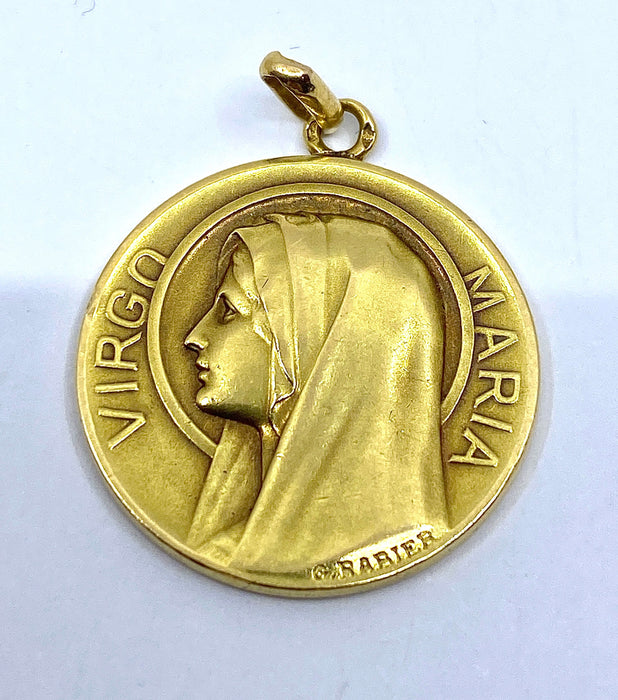 Médaille en or jaune représentant la Vierge Marie, signée G. Rabier