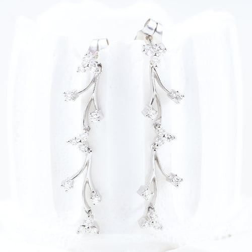 Boucles d'oreilles Boucles d'oreilles en or blanc avec diamants taille brillant 58 Facettes 133721D