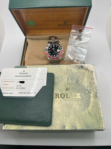 Montre Rolex GMT MASTER II « Coke » 58 Facettes