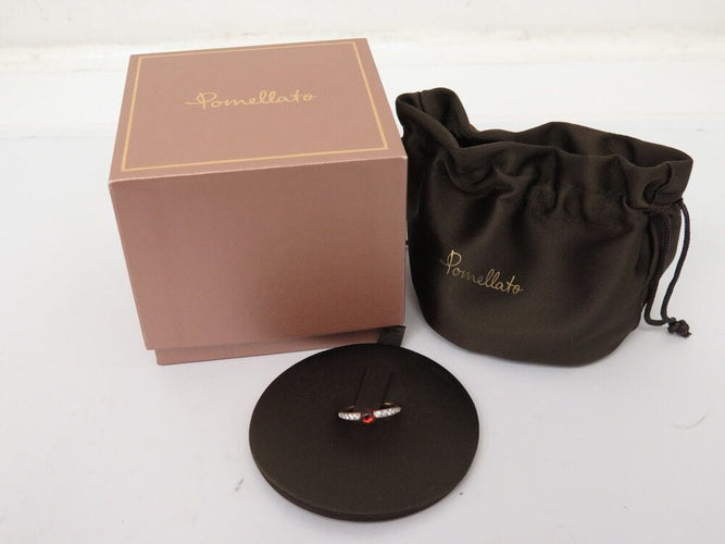 Bague 53 bague POMELLATO m'ama non m'ama grenat 53 diamants or jaune 18k 58 Facettes 268365