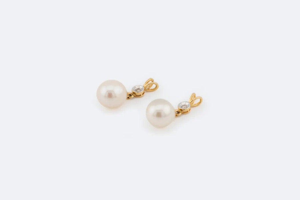 Boucles d'oreilles en or jaune avec perle et diamants