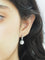 Boucles d'oreilles Dormeuses anciennes en or blanc et diamants 58 Facettes 32108 O