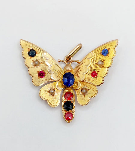 Pendentif Pendentif or rose papillon, pierres de couleur et perles 58 Facettes A05324