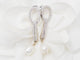 Boucles d'oreilles Pendants d'oreilles en or blanc, diamants et perles de culture 58 Facettes 33102