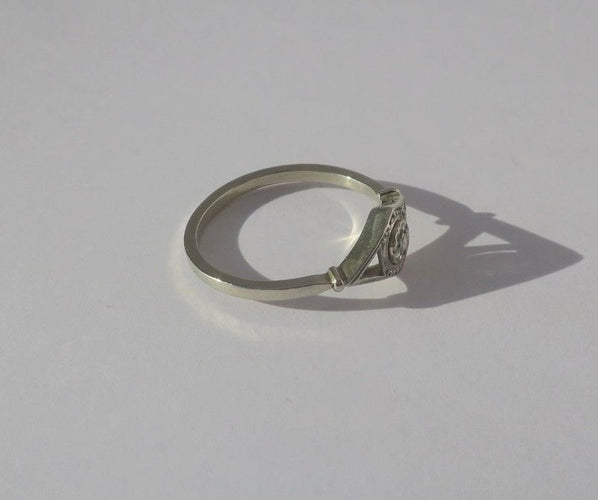 Bague Art Déco en or blanc 18k et platine et diamant