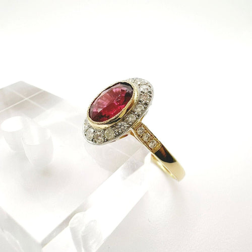 Bague 55 Bague vintage en or jaune avec halo de rubellite et de diamants. 58 Facettes 50347