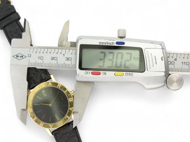 Montre vintage montre BULGARI bb33gl 33mm or jaune 18k bracelet croco  quartz 58 Facettes 270124