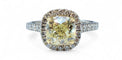 Solitaire en diamant jaune certifié fancy yellow , or blanc 18 carats