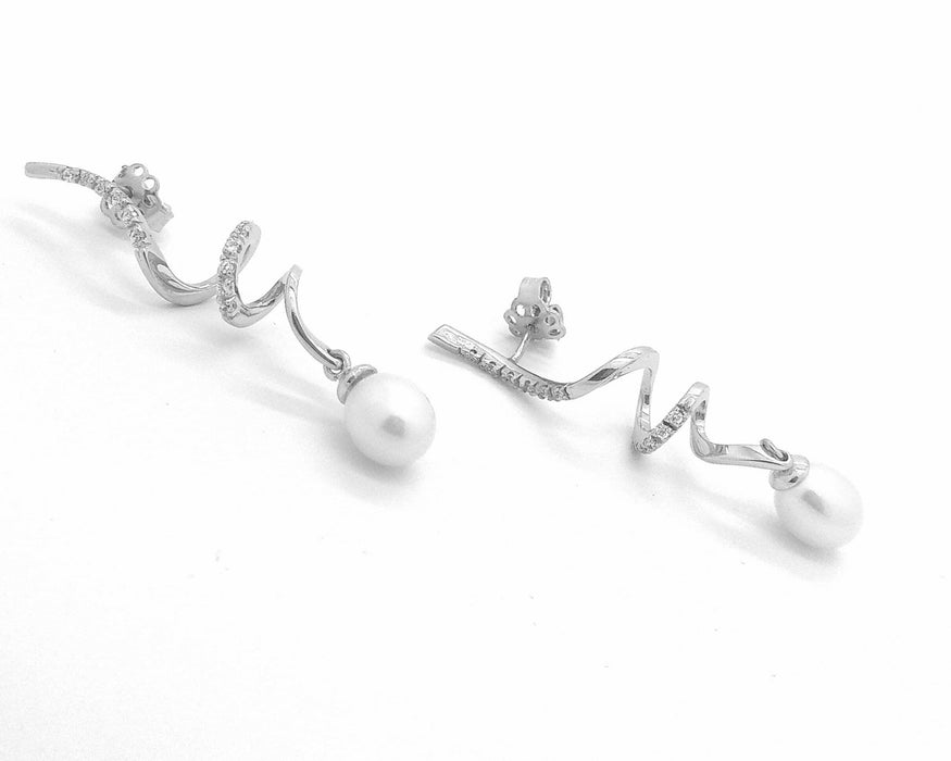 Boucles d'oreilles diamants et perles en or blanc