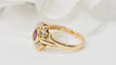 Bague 53 Bague marguerite en or jaune, rubis et diamants 58 Facettes 32917