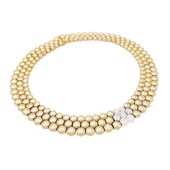 Collier Piaget "Glancy" or jaune, diamants.