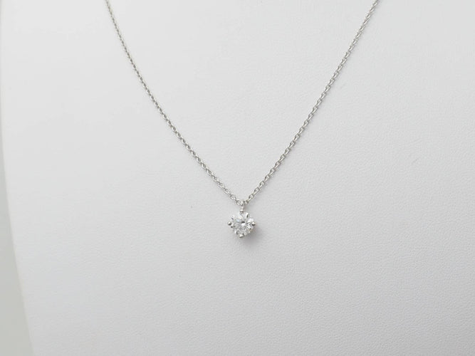 Collier Collier solitaire en or blanc et diamant 0.70ct 58 Facettes 31878