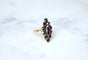 Bague 55 Bague Marquise Ancienne en Or Rose et Grenats sur Paillon 58 Facettes