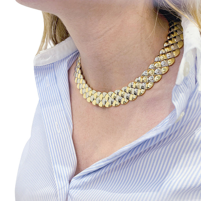 Collier Aldebert or jaune et blanc.