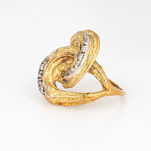 Bague 50 Bague vintage en or jaune et diamants avec nœud infini des années 70 58 Facettes G13169