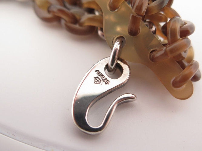 Bracelet bracelet HERMES manchette maillons argent et corne de buffle 58 Facettes 260371