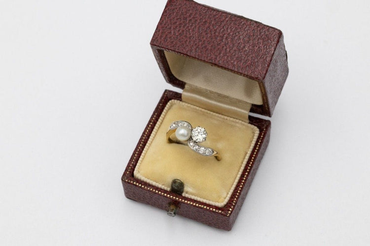 Bague 55 Bague « toi et moi » en or jaune et platine avec perle et diamants, première moitié du XXe siècle. 58 Facettes 11480