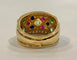 Bague 52 Bague or jaune, saphirs, rubis, émeraude, diamants 58 Facettes