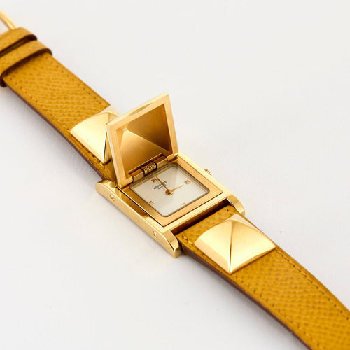 Montre Orange/acier HERMES - Medor Swift - Cuir et plaqué or 58 Facettes