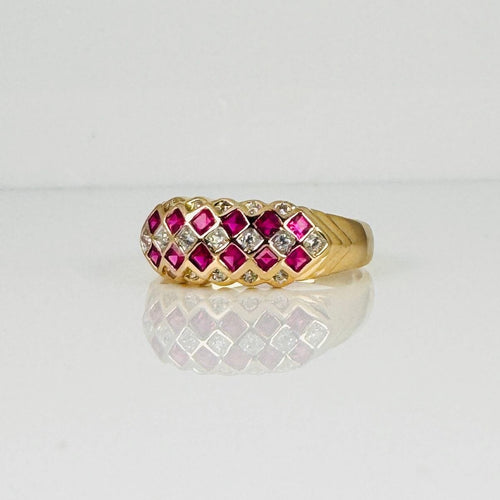 Bague Bague en or jaune ornée de rubis et de diamants à facettes carrées 58 Facettes 2511004