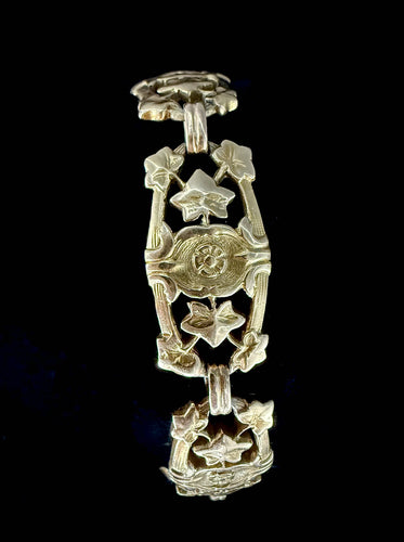 Bracelet Bracelet Art Nouveau or jaune composé de 7 mailles à décor floral 58 Facettes