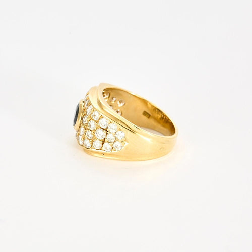 Bague 57 Bague or jaune, saphir central, sertie de 38 diamants 58 Facettes 1-0000102/2
