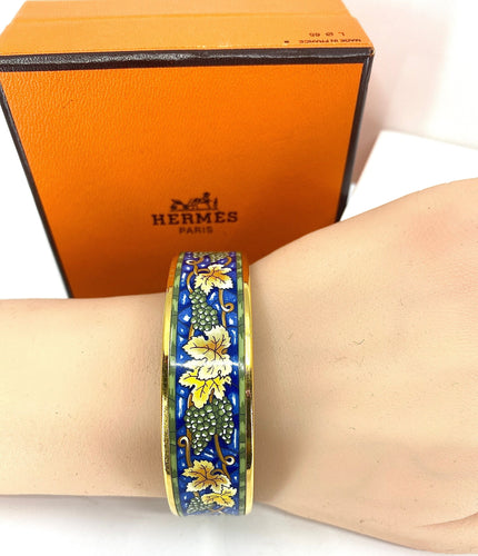 Bracelet HERMÈS - bracelet en métal doré et émail 58 Facettes AB657