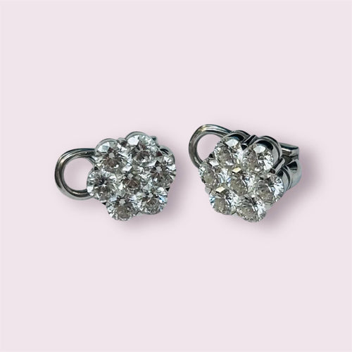 Clips d’oreilles marguerites en or gris et diamants 58 Facettes 258988