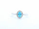 White gold ring with a blue topaz and natural diamonds 58 Facettes 2367