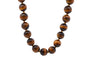 Collier Collier oeil de tigre et or 18k 58 Facettes 25046
