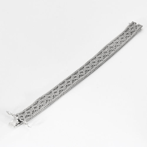 Bracelet Bracelet en or gris articulé 58 Facettes CHA0871