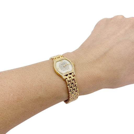 Cartier Watch "Tortue" yellow gold, diamonds, mother-of-pearl. 58 Facettes 33639