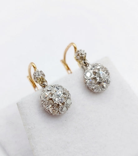 Boucles d'oreilles Dormeuses marguerite - Boucles d’oreilles en or 18k, platine et diamants 58 Facettes A06632