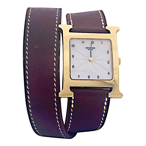 Montre Hermès,"Heure H", plaqué or, acier sur cuir. 58 Facettes 33734