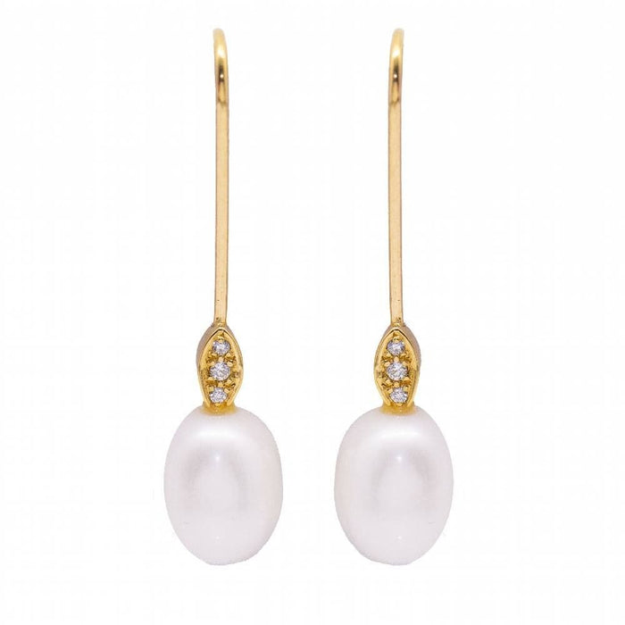 Boucles d'oreilles Boucles d'oreilles avec perle ovale et diamant 58 Facettes D360904FV
