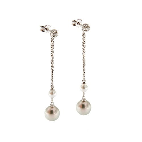 Boucles d'oreilles pendantes en perles et diamants