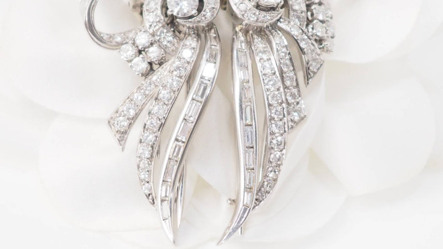 Broche Broche Art déco double clips en or blanc et platine, diamants 58 Facettes 32946