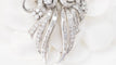 Broche Broche Art déco double clips en or blanc et platine, diamants 58 Facettes 32946