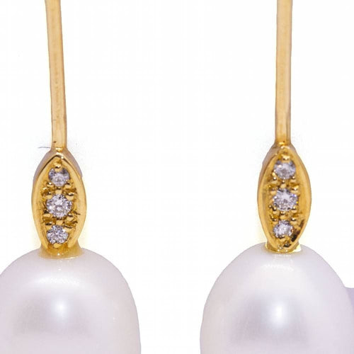 Boucles d'oreilles Boucles d'oreilles avec perle ovale et diamant 58 Facettes D360904FV