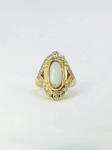 Bague marquise or jaune opale diamants