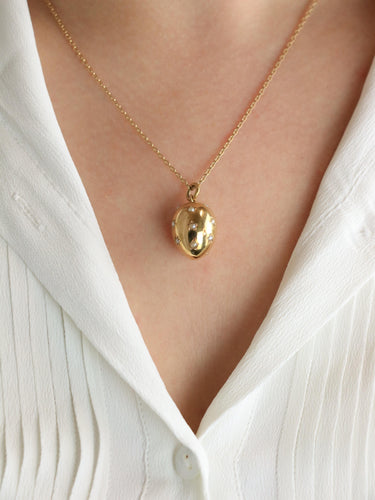 Pendentif Pendentif œuf or jaune perles fines 58 Facettes 1140.3